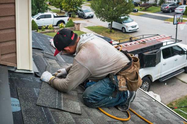 Professional Roofing technician working in Calhan, CO